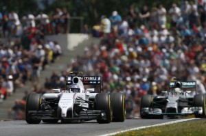 Red Bull Ring, Spielberg, Austria. Sunday 22 June 2014. Valterri Bottas, Williams FW36 Mercedes, leads Lewis Hamilton, Mercedes F1 W05 Hybrid. World Copyright: Glenn Dunbar/LAT Photographic. ref: Digital Image _89P8247